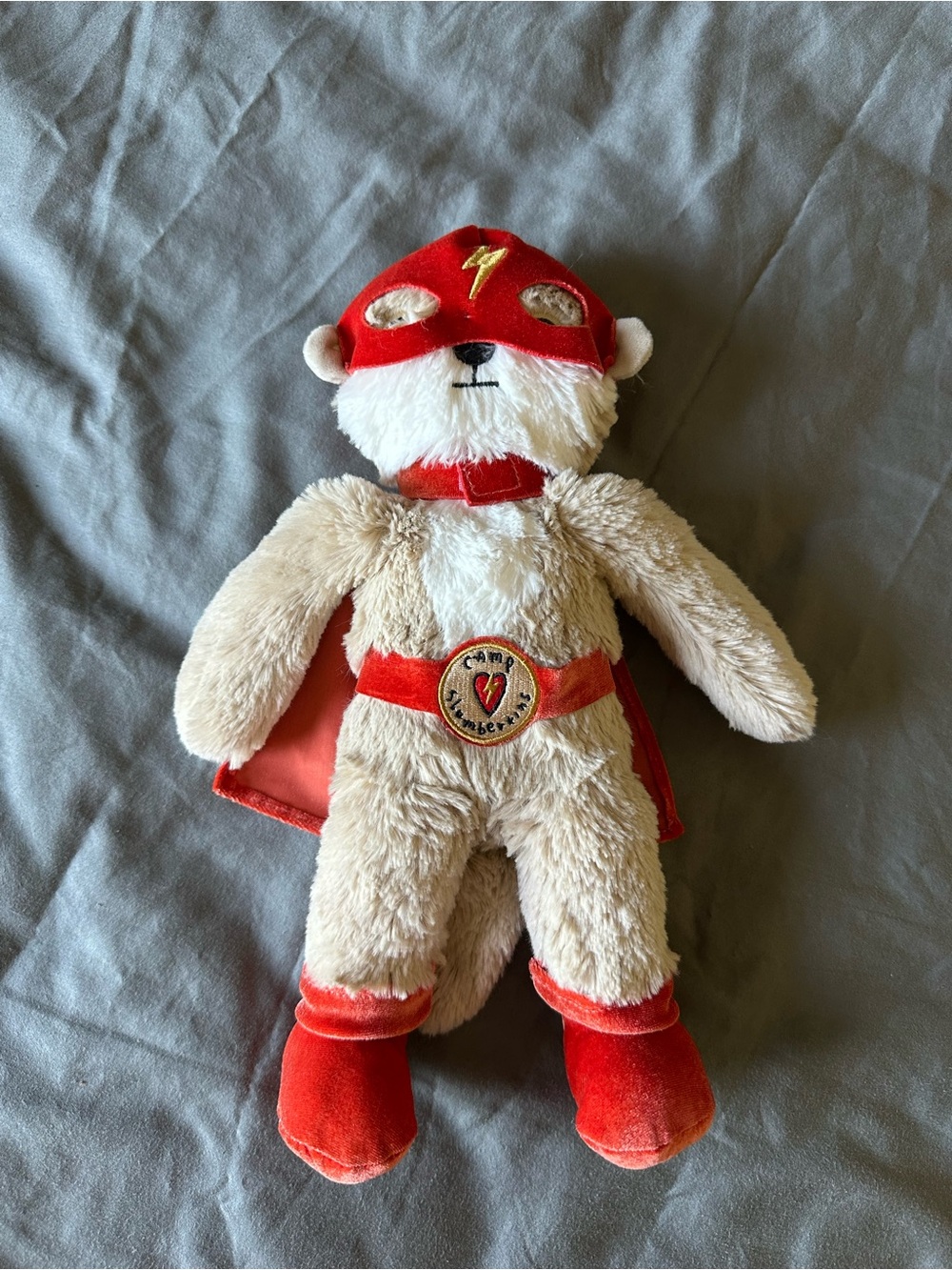 Plush Superhero Otter in Red Costume